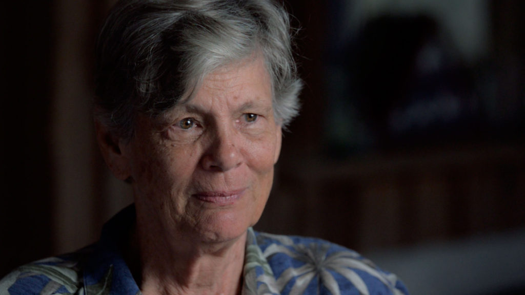 Maggie Hurchalla, woman with short gray hair, sitting at a table, interview about Janet Reno