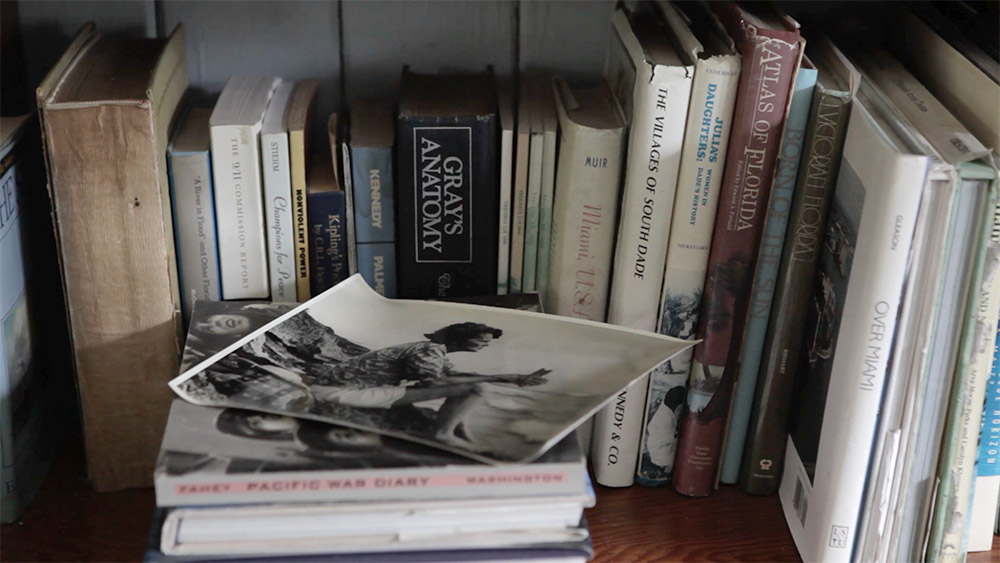 bookshelf with a photo of Janet Reno's mother